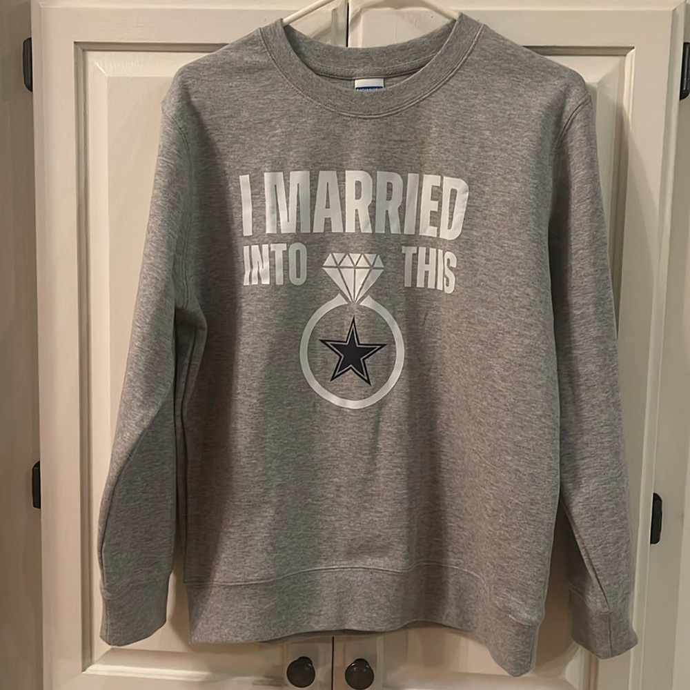 New. Never worn! Cozy  grey “Dallas Cowboys” themed sweatshirt. Size small